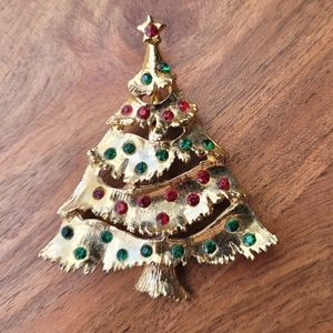 Gold festive Christmas tree brooch pin with red and green gemstones